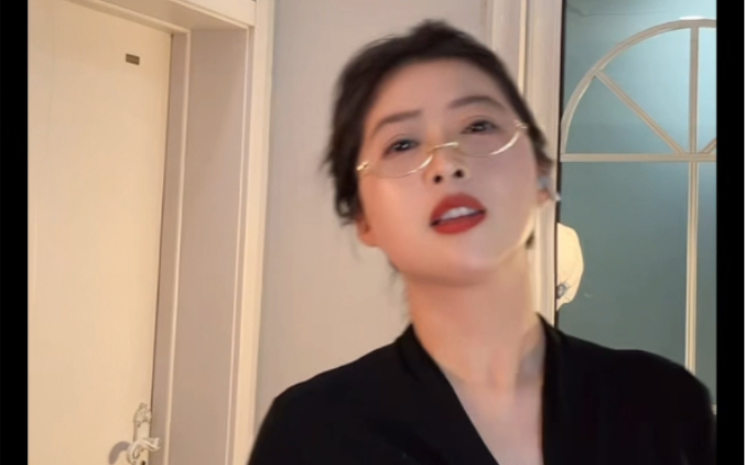 Auntie's gold-rimmed glasses