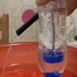 一个可乐瓶子制作一个抽水机