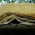 舌尖上的中国:传统石磨下的煎饼卷大葱。