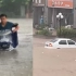 郑州暴雨道路成河 市民齐腰深水中骑电动车涉水前行 商铺被淹严重