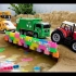 汽车玩具之组建积木块桥让挖掘机、压路机、起重机、卡车通过的沙子游戏