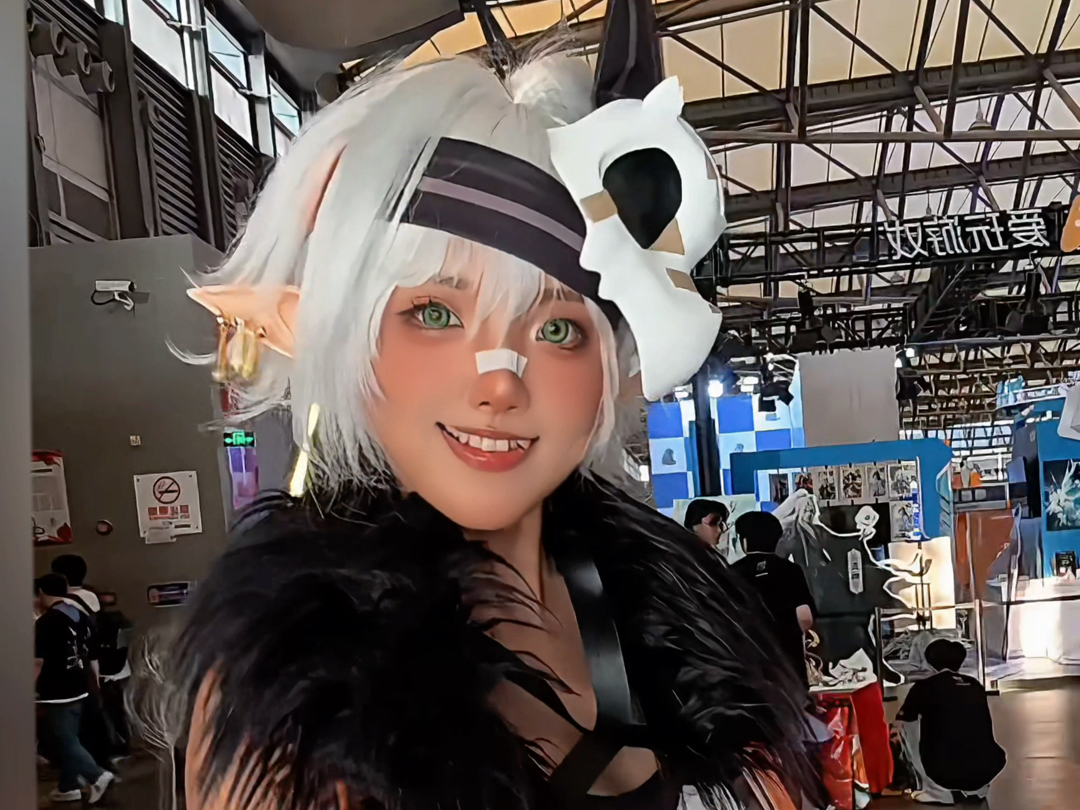 Black skinned, white furred elf, but a fitness instructor