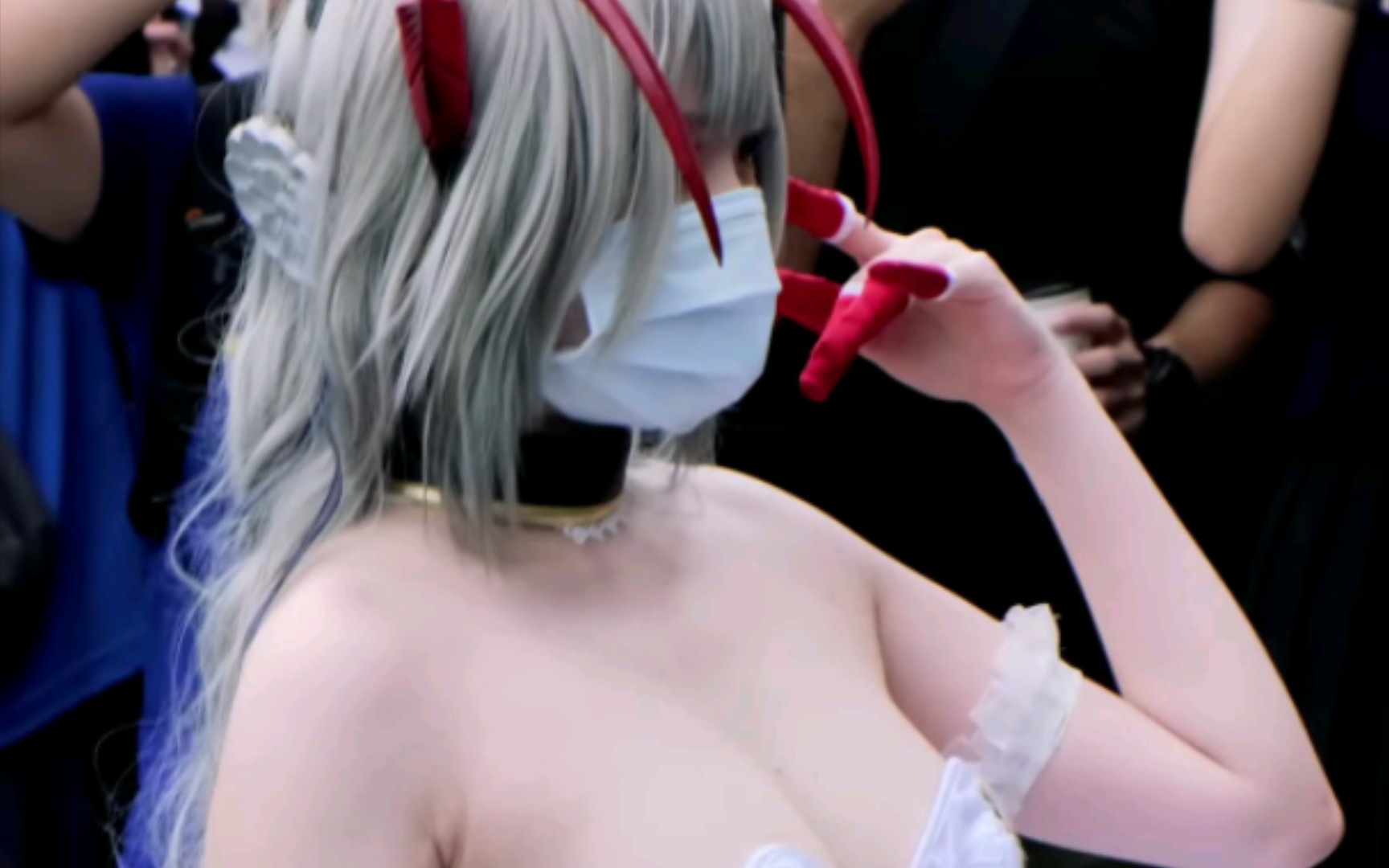 Comic-Con show floor shots, vertical screen.