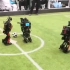 沈阳城市学院的机器人会踢足球！在刚刚结束的2O19机器人世界杯中国赛决赛中，沈阳城市学院队4：1胜浙江大学队，蝉联中国赛