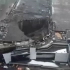 航拍莫斯科音乐厅遭恐袭后画面：屋顶坍塌露大洞，舞台一片废墟