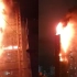 韩国一33层高楼发生火灾 整栋楼被吞噬，燃烧的外装材料四处飘散