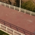 一个女孩在人行天桥上慢跑 空中拍摄  航拍运动高清视频素材 1080P