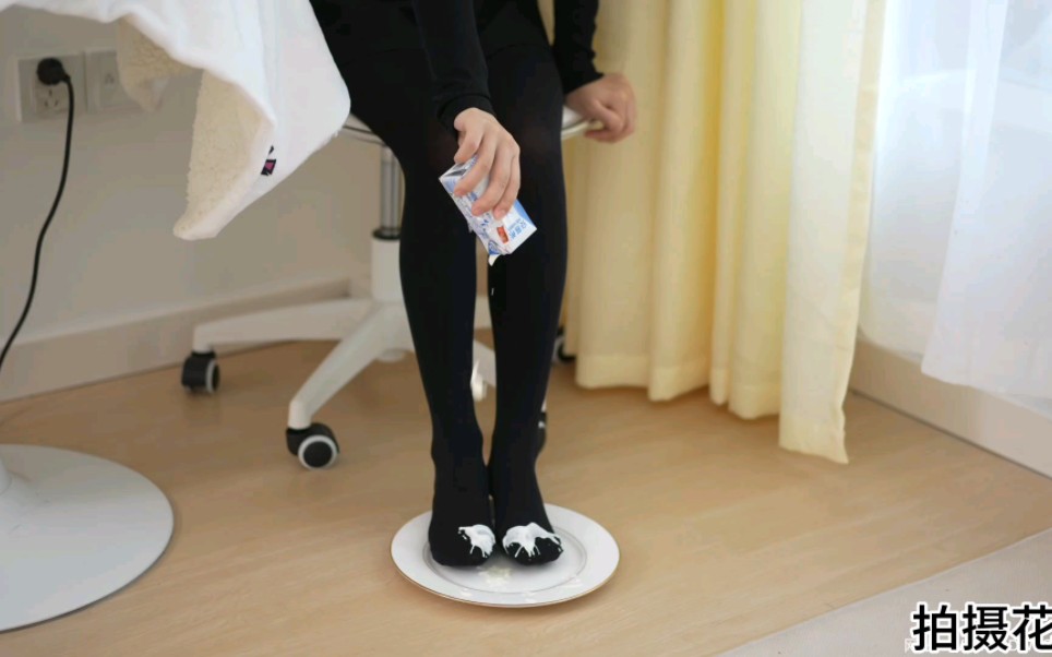 Yogurt sprinkled on thick black, chocolate ice cream.