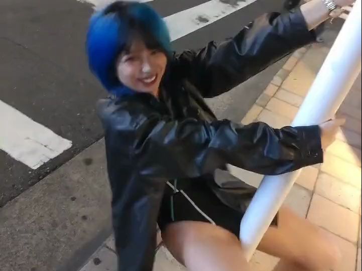 The neon girl who got into it with the pole.