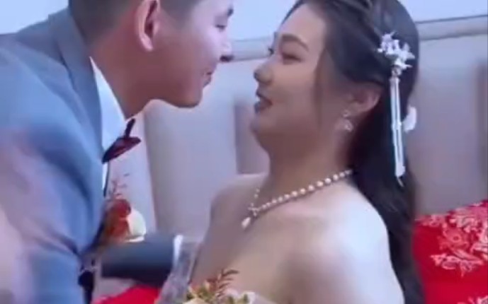 The bride looks like a good husband.