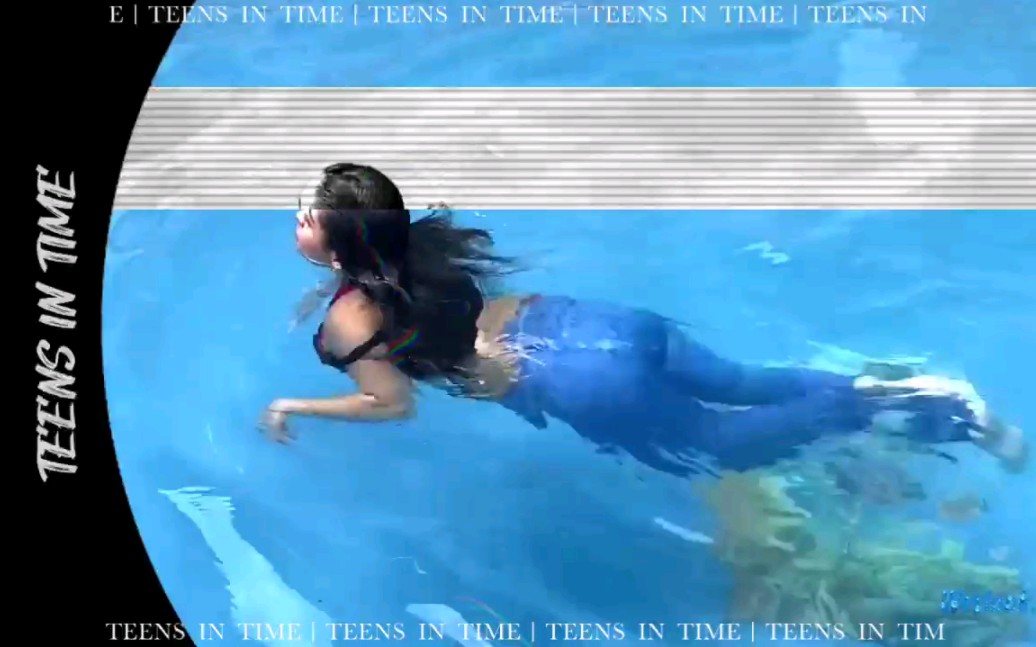 Underwater girl - wet jeans - swimming in jacket