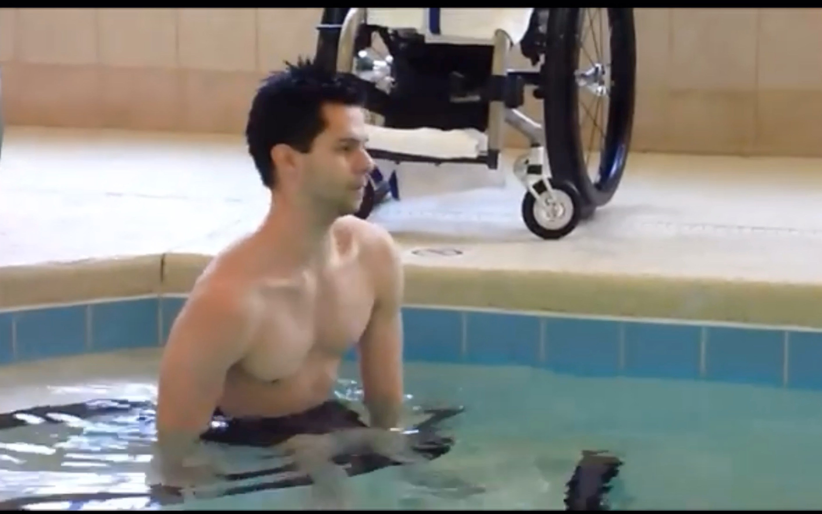 How does a paraplegic wheelchair user swim and transfer