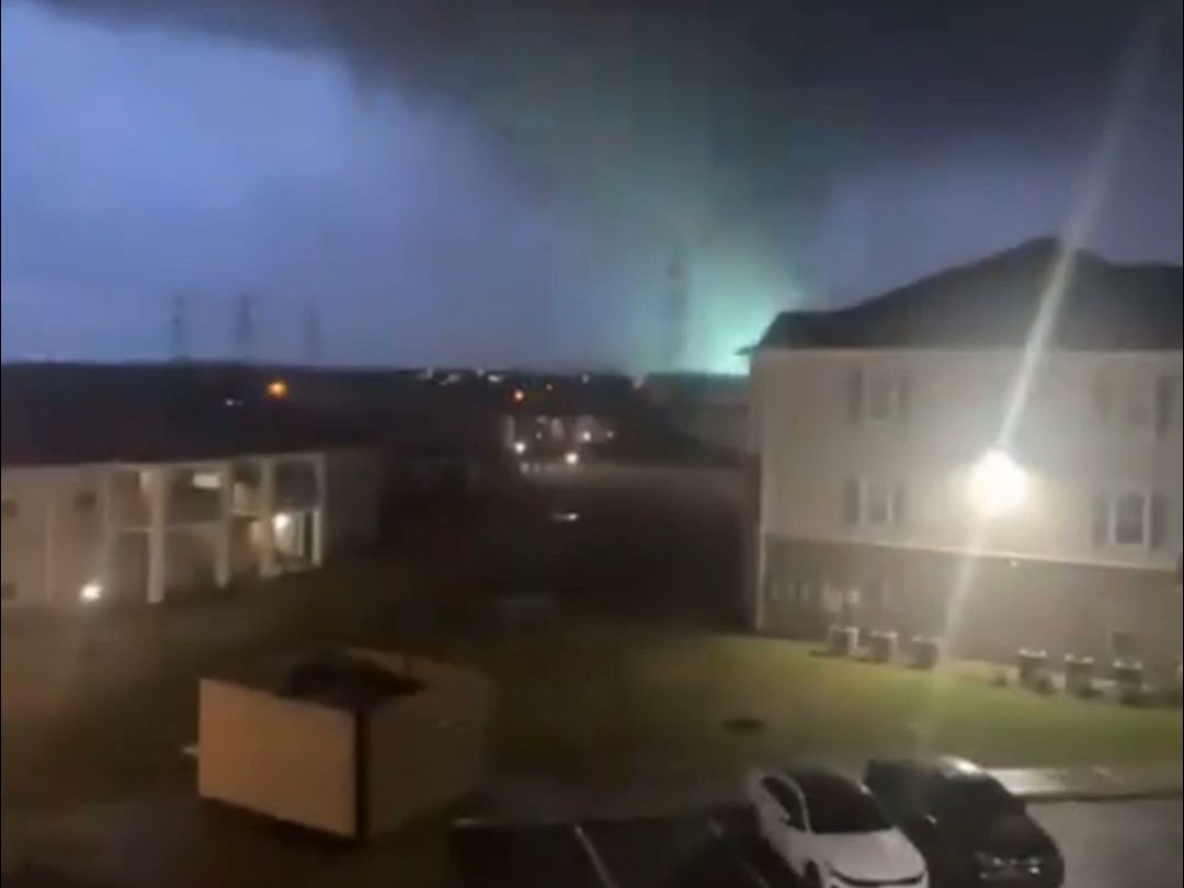 A tornado accompanied by heavy lightning