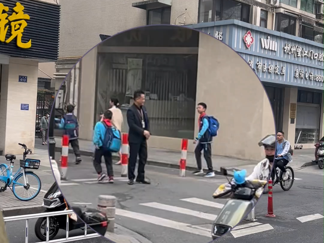 杭州一小学校长每天早上在路口迎接学生,风雨无阻.和每一位学生击掌.#校长每天早上在校门口迎接学生 #校长哔哩哔哩bilibili