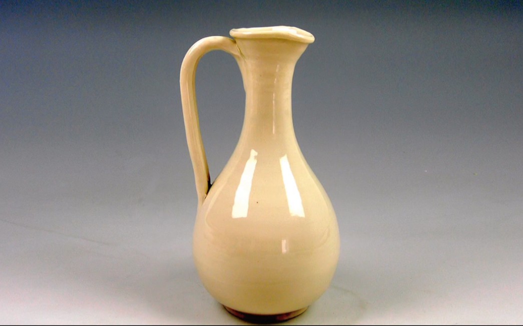 唐代定窑白釉花浇