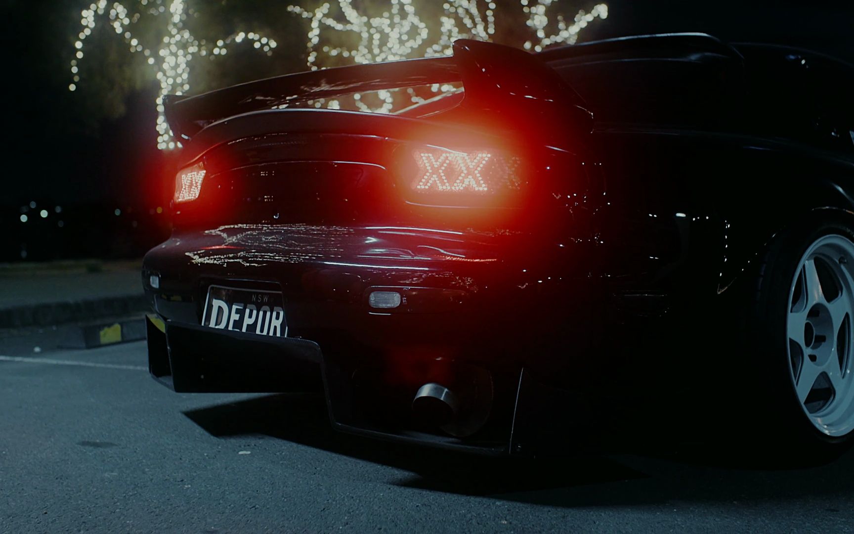 【rx7】尾灯是两个阿叉的黑色rx7