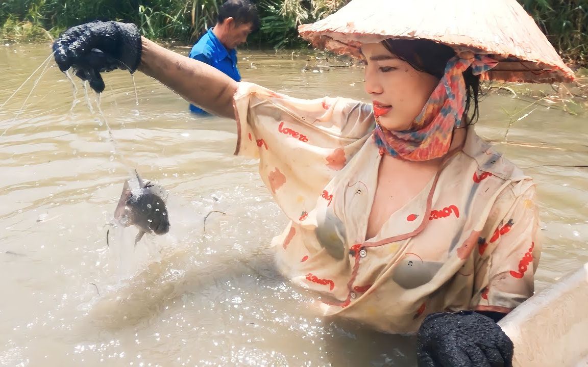 越南女人捕鱼图片