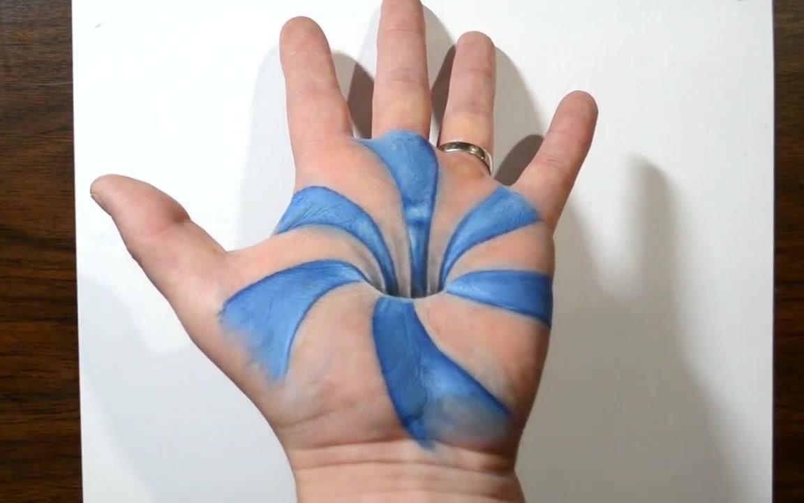 国外小哥手上作画3d立体画手上穿孔真实到心悸