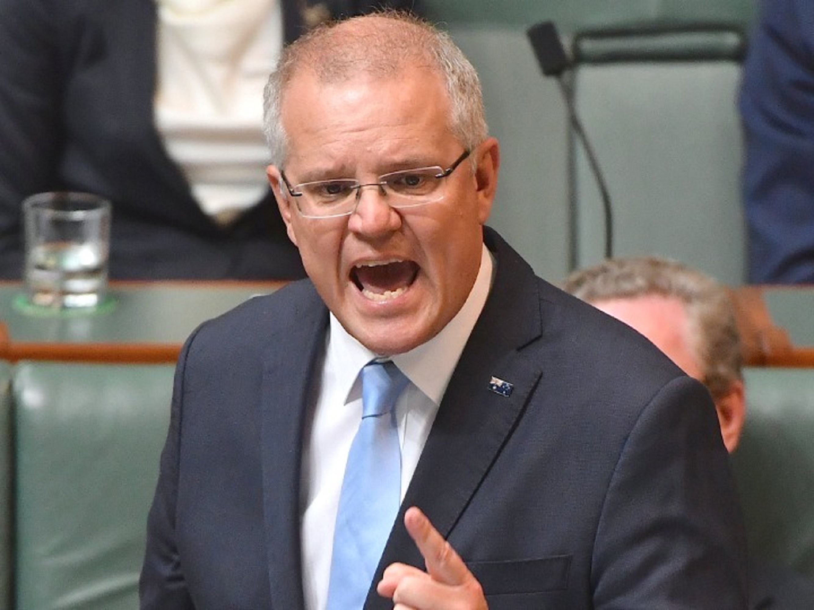 莫里森公开道歉,海地总统葬礼发生骚乱,混乱背后再现美国身影