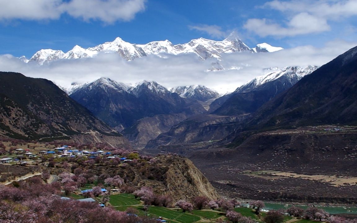 索松村三座雪山图片