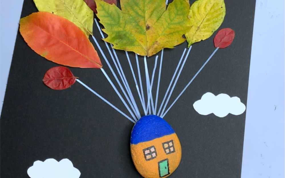 用树叶和石头粘贴一幅会飞的小屋,简单好玩,快来试试