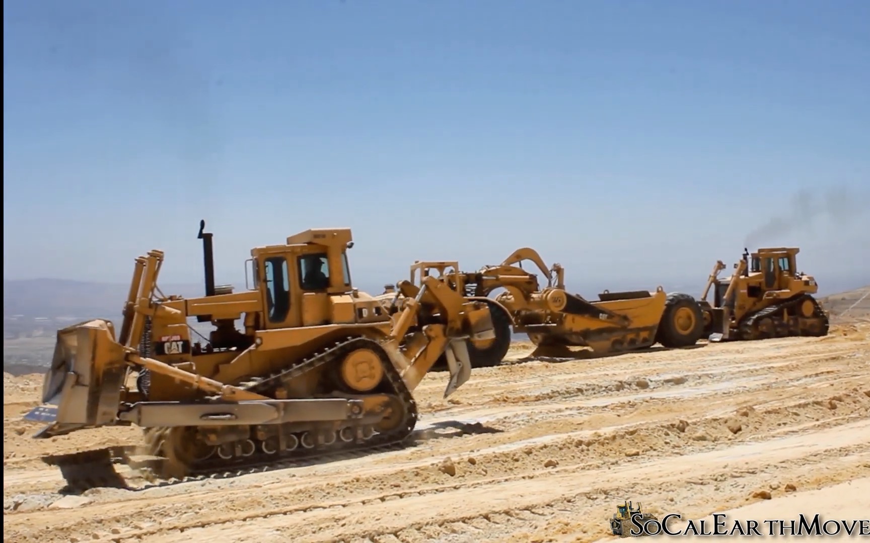 d9推土机推装的cat 631d铲运机