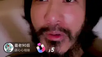 Video herunterladen: 王力宏回应为何不刮胡子