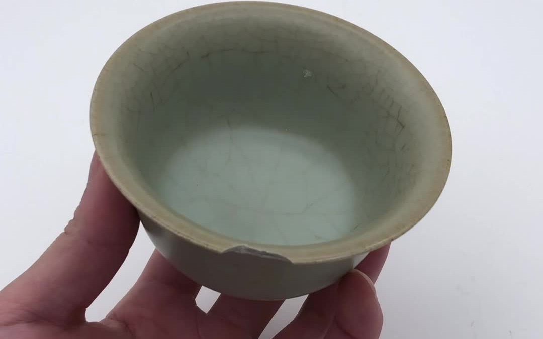 锔瓷修复汝窑碗手工錾刻一朵莲花高温镶嵌在缺口