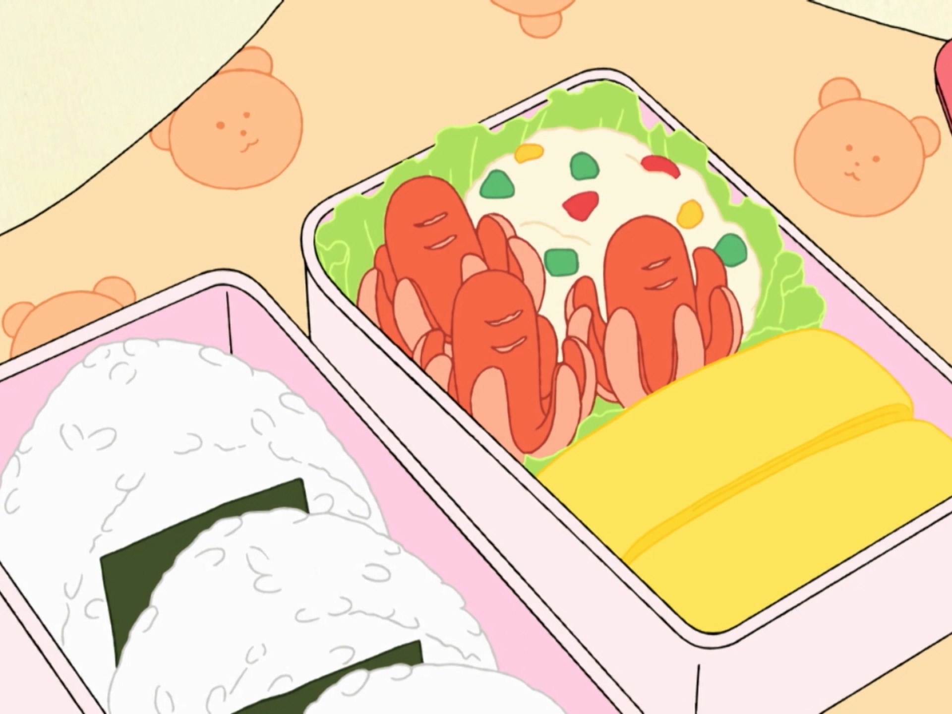 小丸子的便当里有章鱼型香肠和煎鸡蛋饼