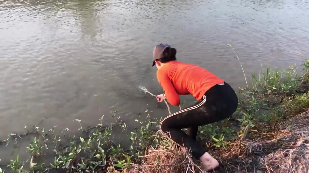 越南女人捕鱼图片