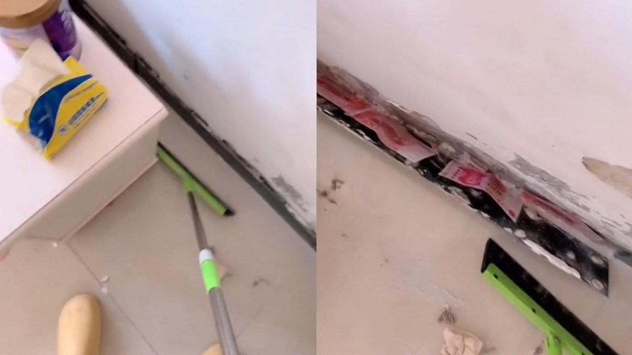 女子在家打扫卫生时瓷砖突然脱落低头一看发现惊喜笑得合不拢嘴