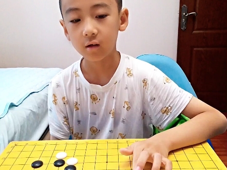 围棋定式小目小飞挂一间低夹