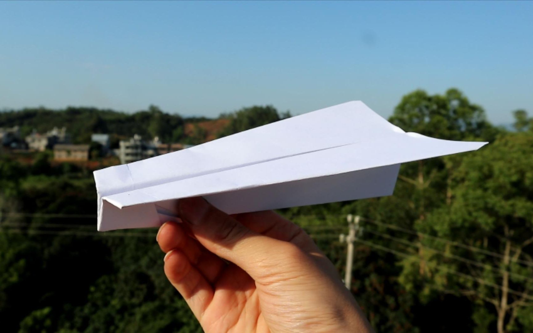 飞得久的纸飞机图片