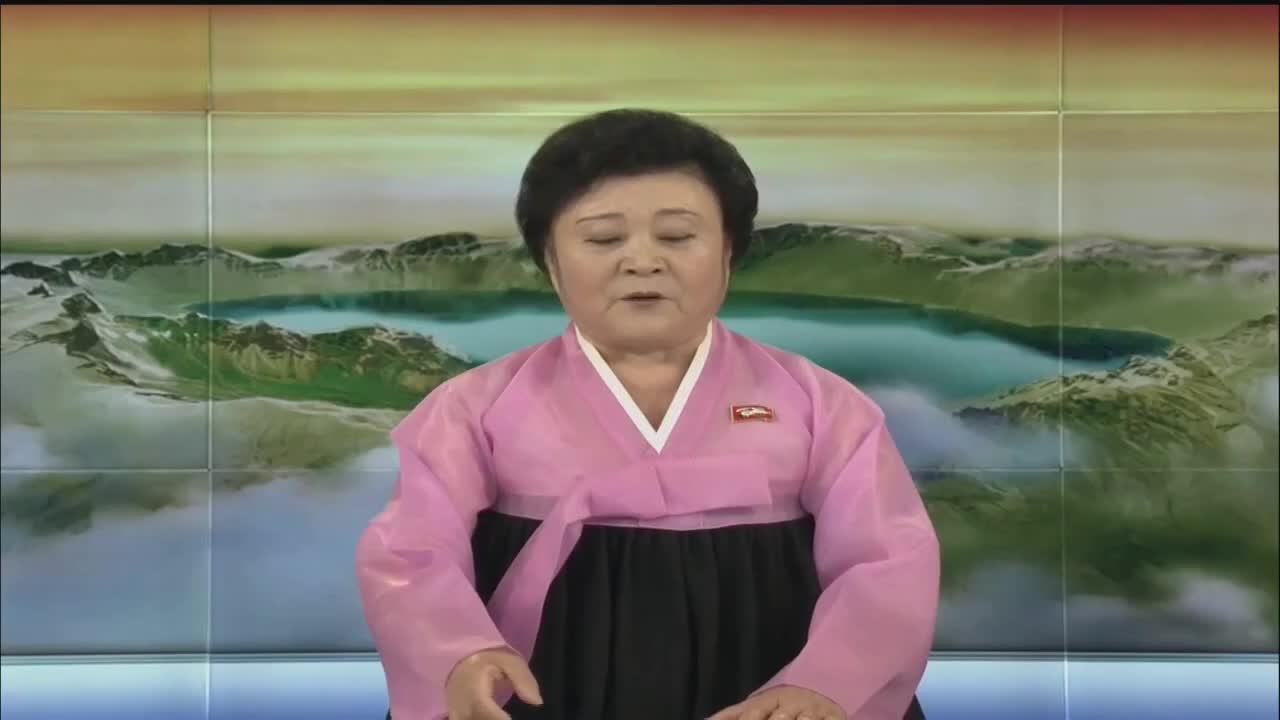 朝鲜播报员李春姬图片