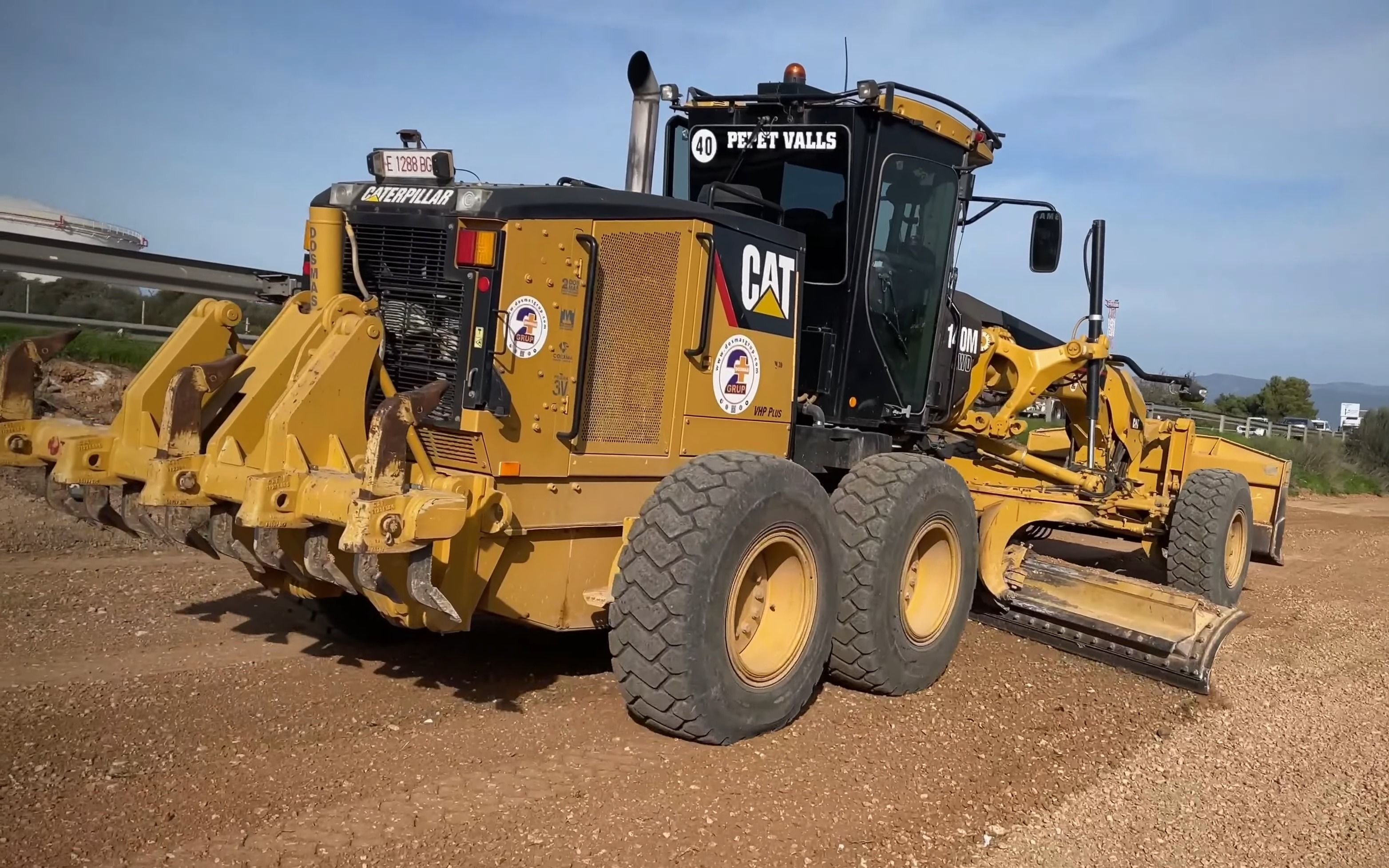 cat 140m平地机施工作业4k