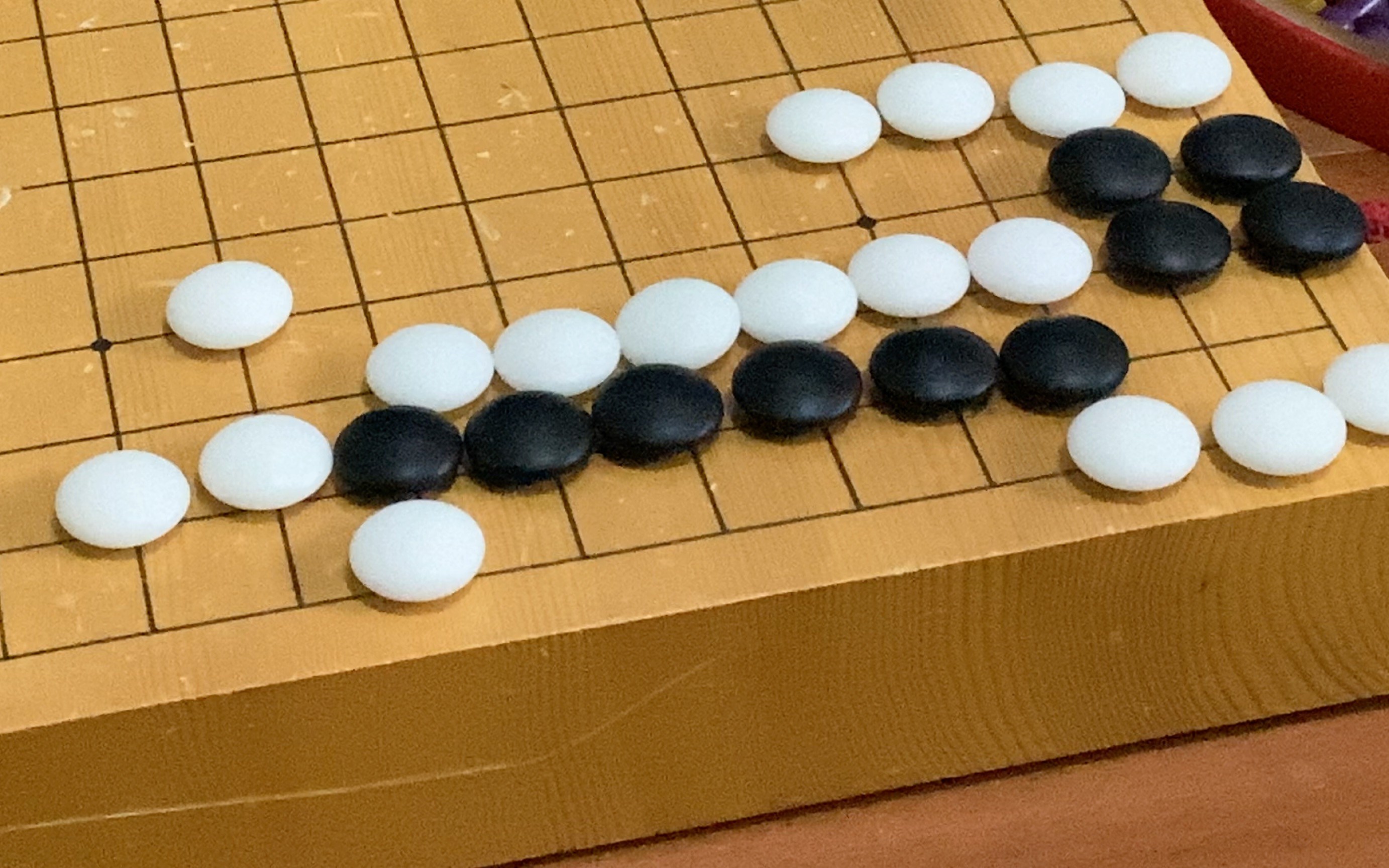 围棋死活题,倒脱靴基本型,难度业余4段技巧