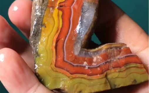 腊肉块状战国红原石