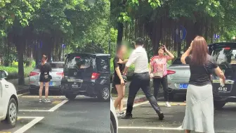 Download Video: 女子人肉占车位导致堵车，男子看不惯一把推开：珠海是你的吗