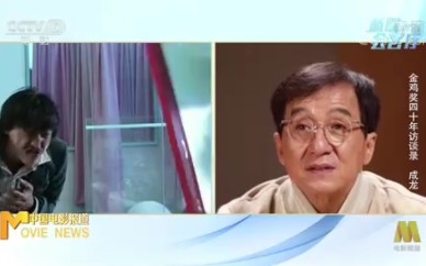 [图]成龙看自己演的电影和感概