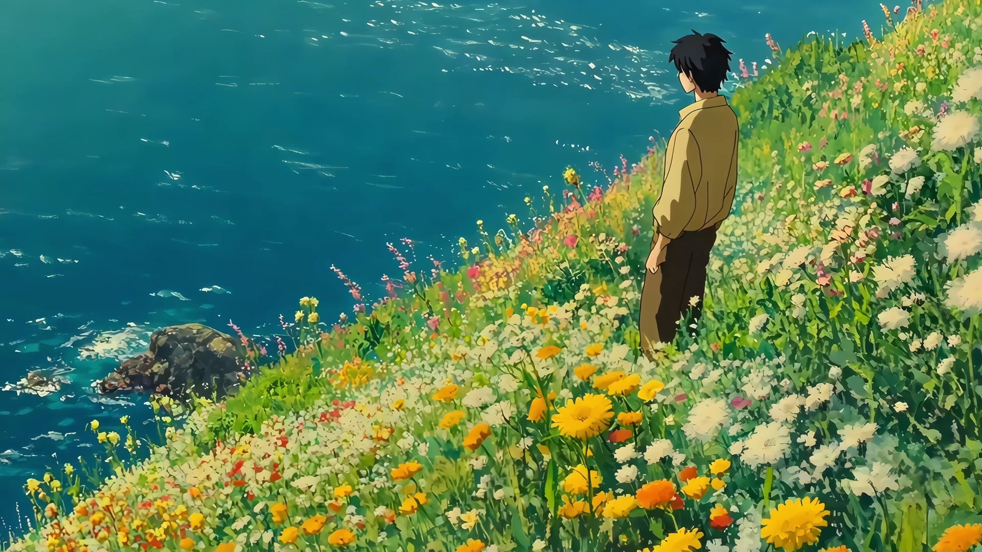 ‌ 海岸上的孤独,一个孤独的男孩站在翠绿的山丘边