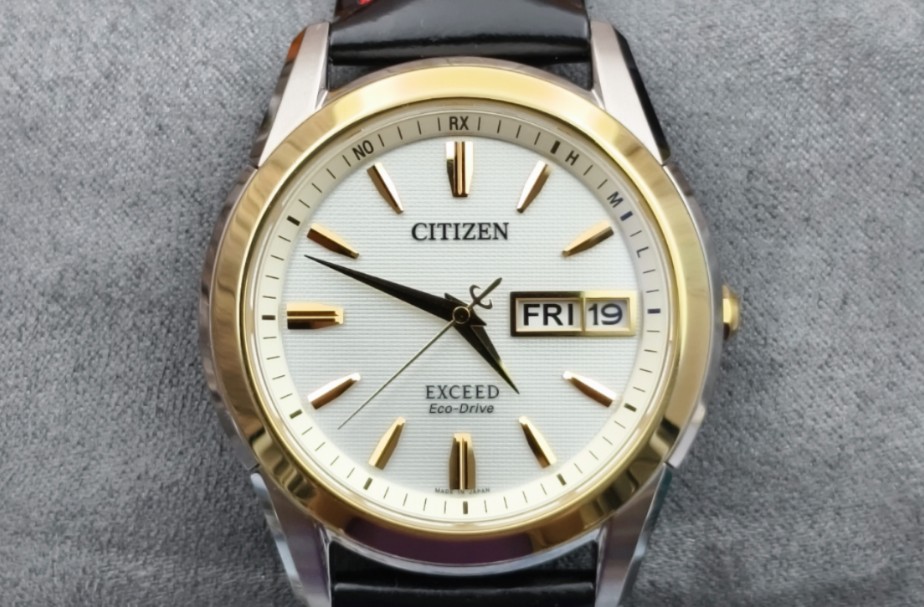 西铁城高端双历exceed钛合金光动能电波表