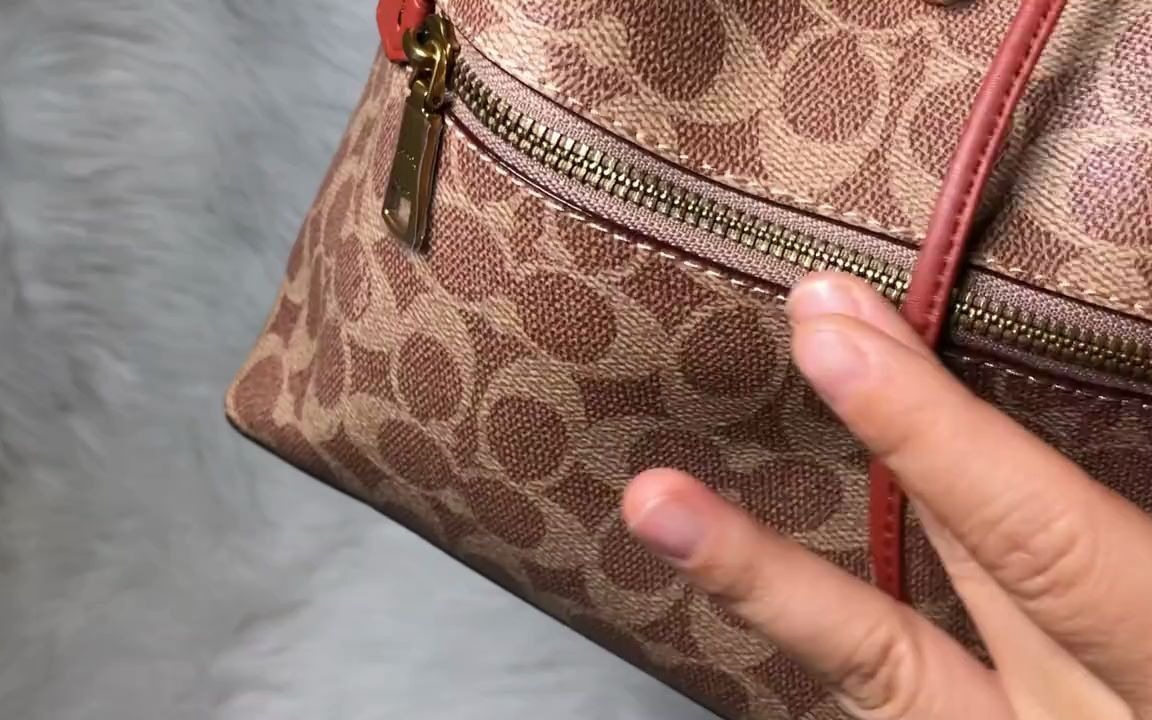 coach-蔻馳橘棕色logo老花復古時尚evie揹包雙肩包女包分享