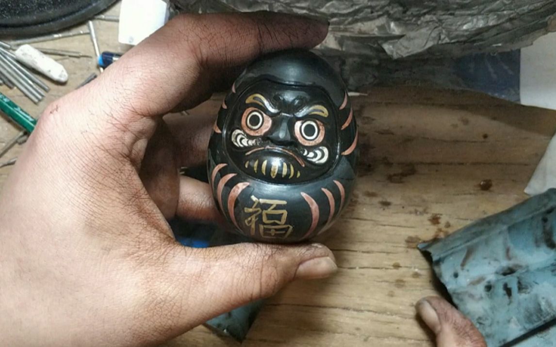 达摩不倒翁倒了