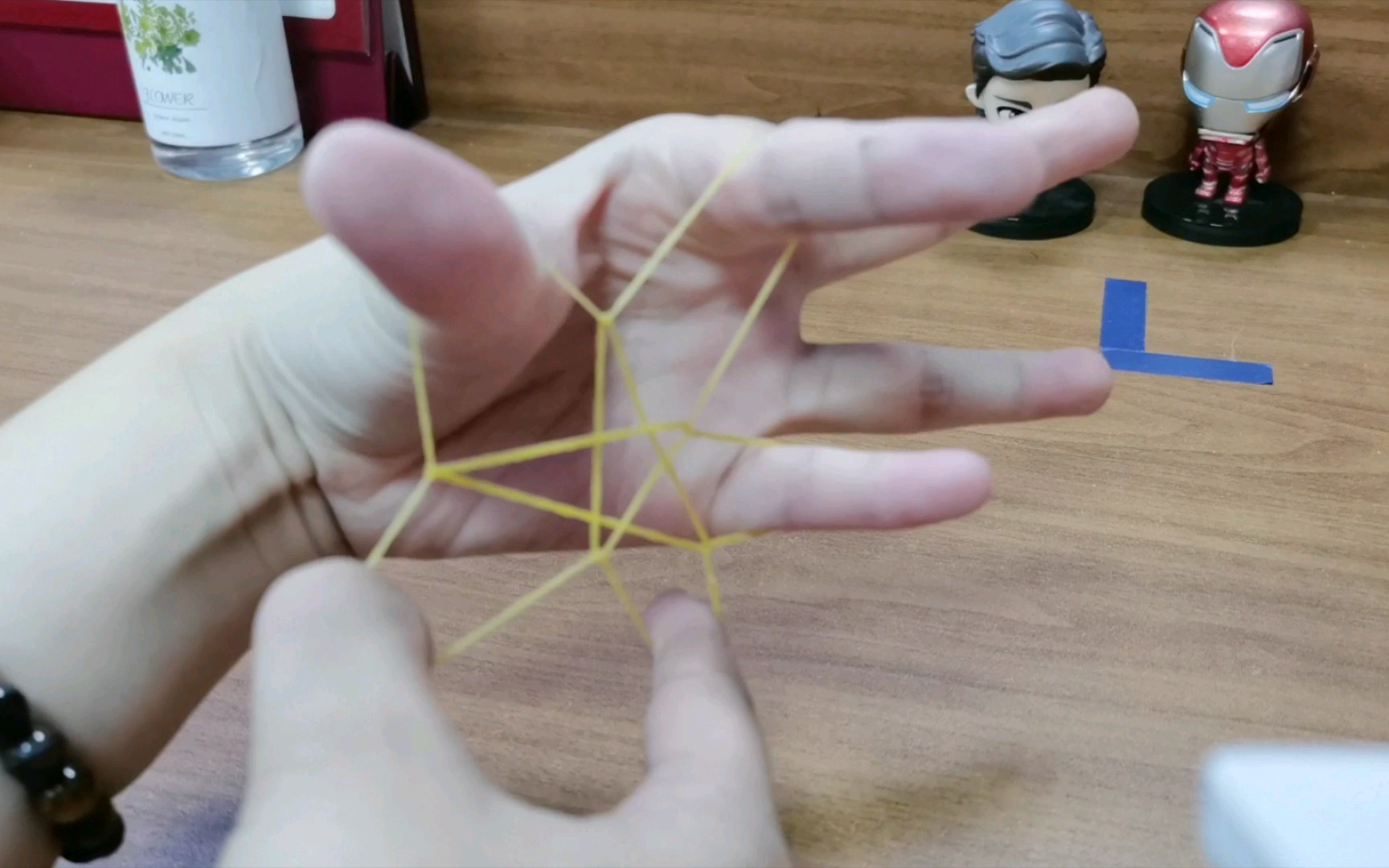 如何用橡皮筋拉出双五角星,童年的一种小游戏
