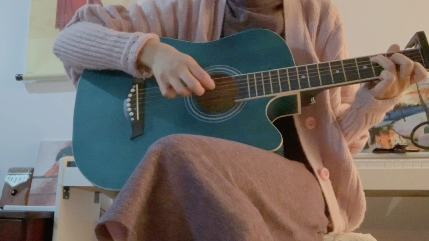 melancholy吉他弹唱只会哼哼