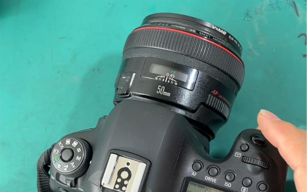 佳能50mm1.2镜头光圈释放不自如,维修与更换