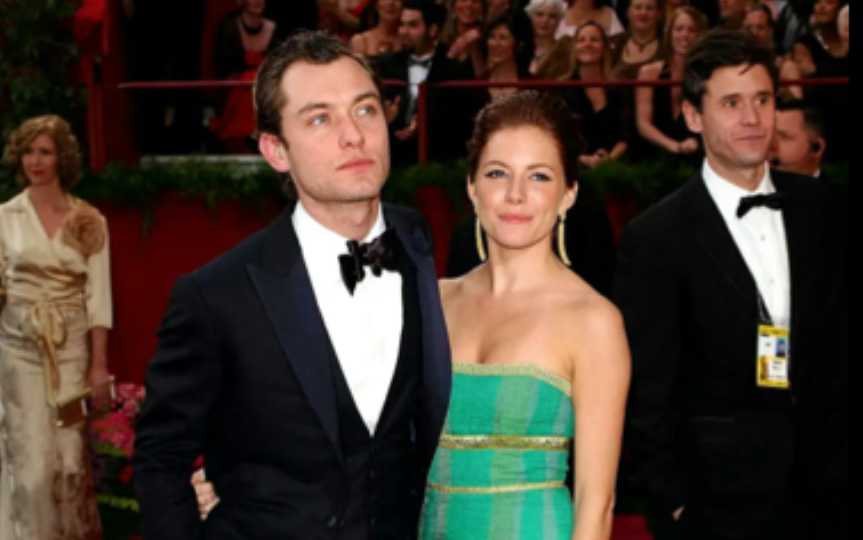 裘德·洛 jude law和西耶娜·米勒 sienna miller 一起出席奥斯卡颁奖
