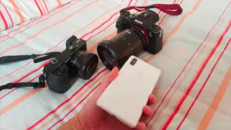 Скачать видео: 小米 mix2s  A6000  A7r2  底大一级到底到对画质影响多少