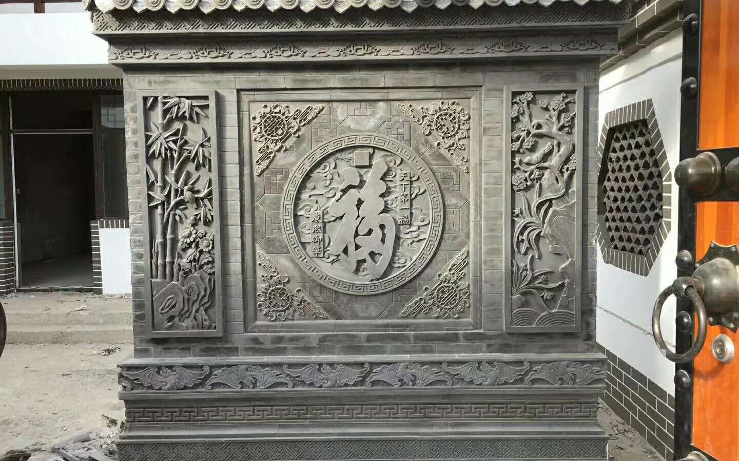 庭院中式风格|中式庭院设计福字砖雕背景墙用的是仿石材搭配青砖