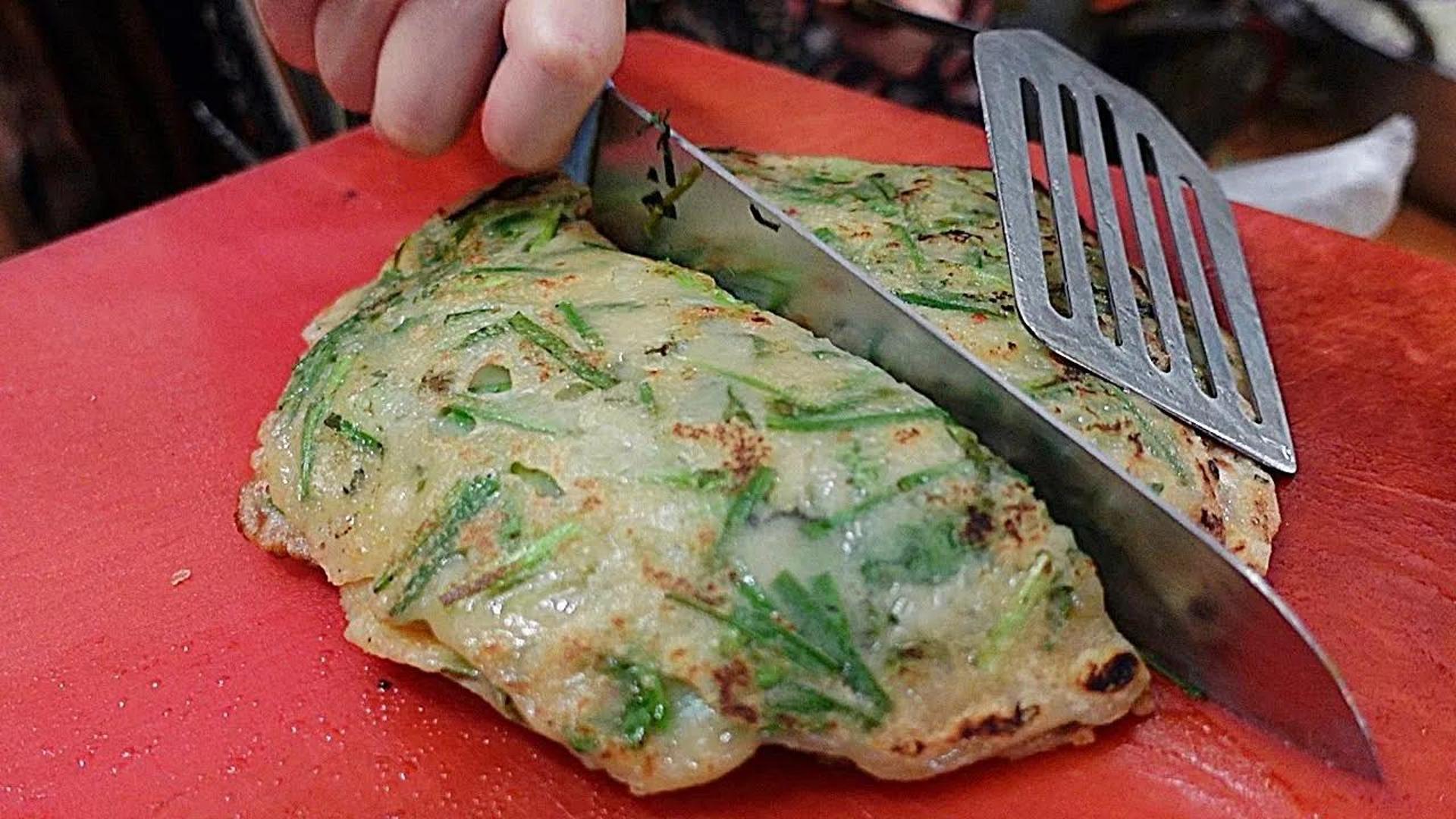 盖成比煎饼500韩元一天只卖200个的煎饼街头食品韩国传统煎饼韩国街头